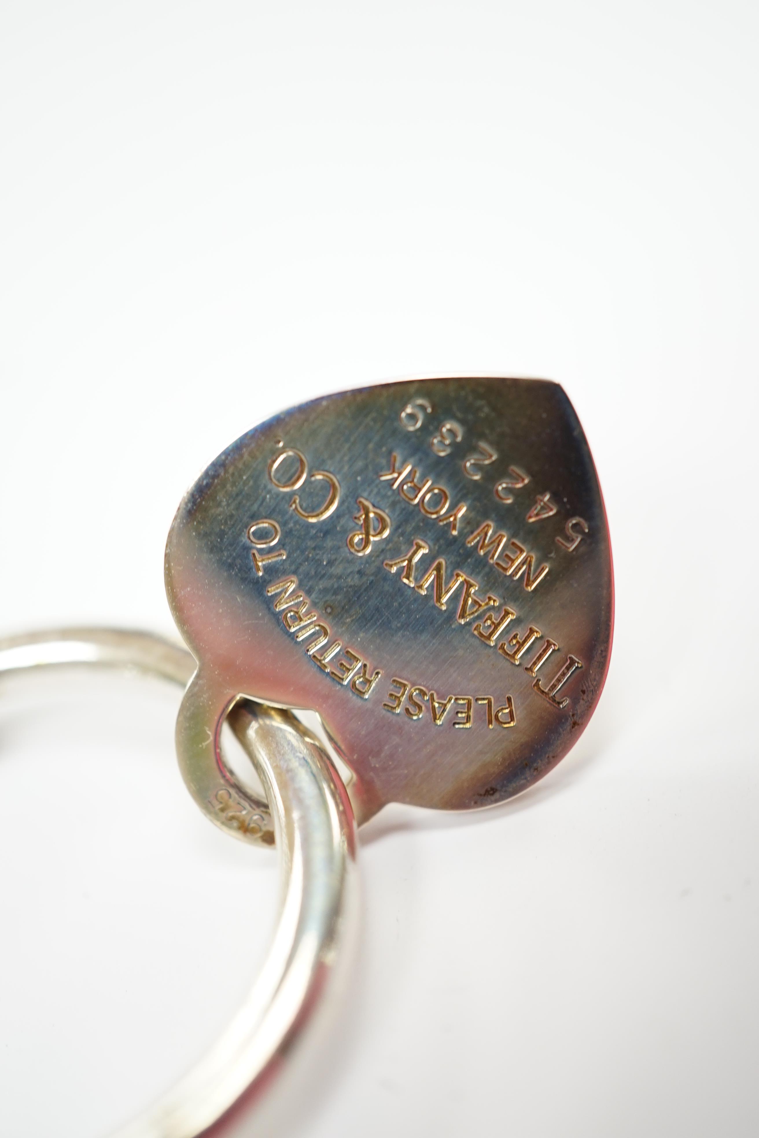 A modern Tiffany & Co 925 keyring, width 31mm, with box and papers.